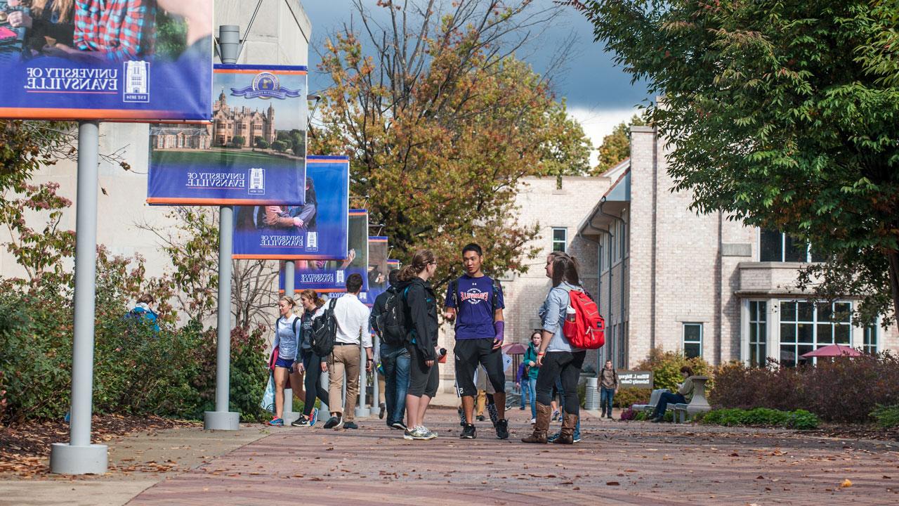 Students outside talking between classes